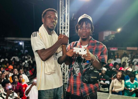 Big Moment in Kpando! Kwejo Underboss Gifts MC Gbeta an iPhone 13 at Zone 6 To The World Concert